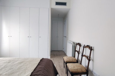 Example of an eclectic bedroom design in Other