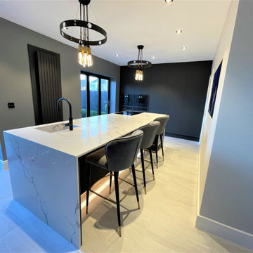 Graphite Satin Feel Breakfasting Kitchen with Oak Accent and Wall Hung Media