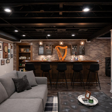 Finished Basement with Irish Themed Bar, Gym, Bathroom and Gamer Area in Canton,