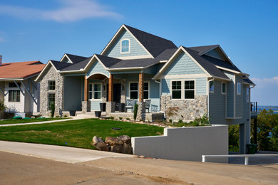 Example of a farmhouse exterior home design in Austin