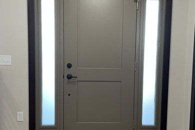 Mid-sized minimalist entryway photo in Other with white walls and a gray front door