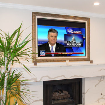 Vutec Motorized art screen with custom soundbar above tv