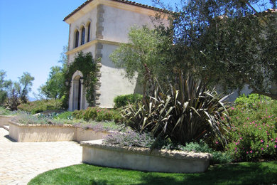 Design ideas for a mediterranean house exterior in Santa Barbara.