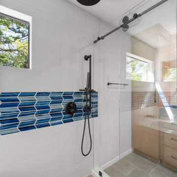 Luxurious Shower with Rainfall Head and Blue Accent Tile