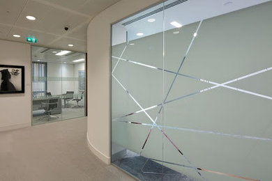 Study room - large industrial study room idea in Calgary