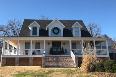 Example of a classic exterior home design in Other