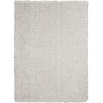 Nourison - Nourison Luxe Shag 8'2" x 10' Light Grey Shag Indoor Area Rug - This exceptionally plush 2-inch-deep flokati shag rug from the Nourison Luxe Shag Collection has the look and feel of luxuriously soft sheepskin, and makes a perfect addition to any casual room setting. Luxurious texture and pale grey color for a warm, soothing accent.