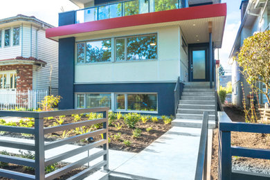 Photo of a contemporary home design in Vancouver.