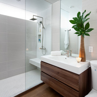 Example Of A Minimalist Gray Tile Bathroom Design In Toronto With An Integrated Sink Flat
