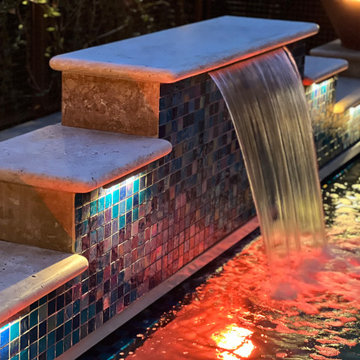 Slope Serenity: Elevated Outdoor Oasis with Hillside Pool