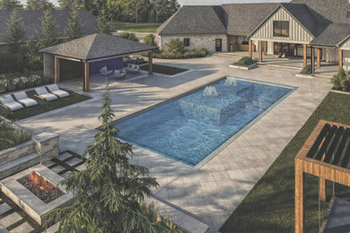 Large transitional backyard stone and custom-shaped pool landscaping photo in Cleveland