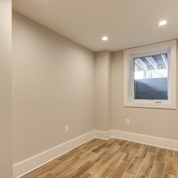 Basement remodeled with bedroom space and extra closet space in Vienna