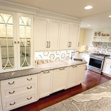 White Cabinets, Grey Countertops and Edgy Tile Backsplash