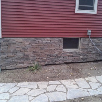 Cultured Stone Foundation with Bluestone Walkway