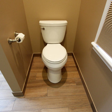 Master Bath Beige/Brown Porcelain Tiled Shower, White Vanity with Vessel Sink
