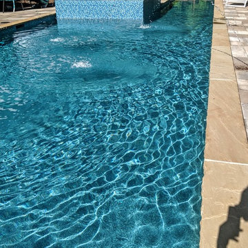 Gorgeous Glass Tile 360 Spillover Spa and lap pool