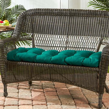 Wicker Loveseat with a Rich Forest Green Cushion