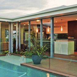 Aluminium Sliding Doors and Louvre Windows in Ultra Silver frames - Windows And Doors
