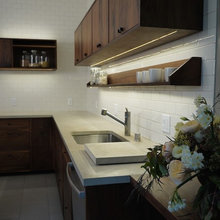 Love the high cAbinets and floating shves