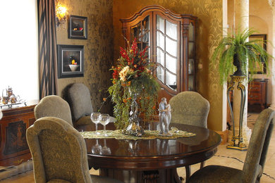 This is an example of a mid-sized dining room in Denver with beige walls and ceramic floors.