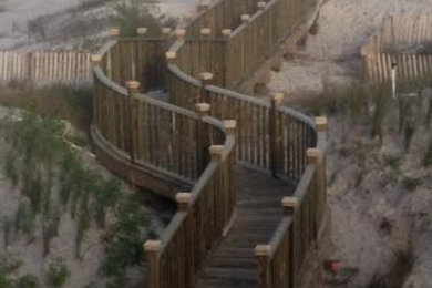 Example of a beach style home design design in Jacksonville