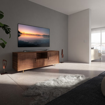 Living room at Austurhöfn apartment complete with smart TV and AV controls.