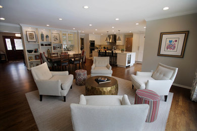 Living room - mid-sized transitional open concept medium tone wood floor and brown floor living room idea in Detroit with gray walls