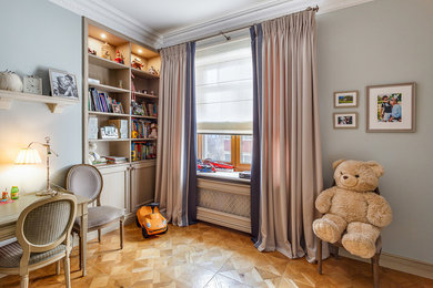 Design ideas for a large traditional kids' study room for kids 4-10 years old and boys in Moscow with grey walls and medium hardwood floors.