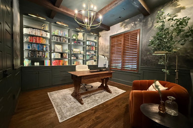 Mid-sized 1950s freestanding desk dark wood floor, brown floor, exposed beam and wallpaper study room photo with green walls