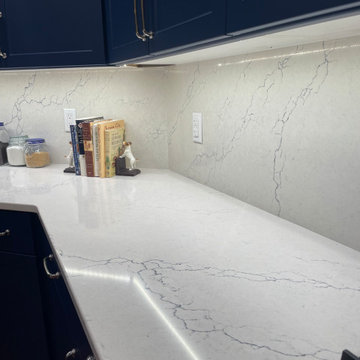 Transitional Kitchen Remodel Done in a Navy Blue Shaker Style Door