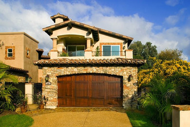 Mediterranean exterior home idea in San Diego