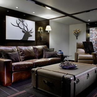 This is an example of a rustic fully buried basement in Other with carpet and black floors.