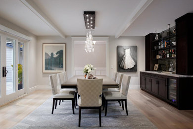 Inspiration for a transitional light wood floor dining room remodel in San Francisco with white walls