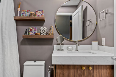 Example of a transitional home design design in Toronto
