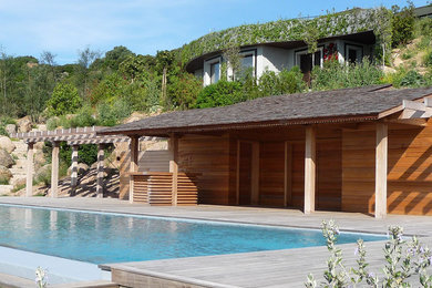 Inspiration for an expansive coastal garden in Corsica with a living wall.