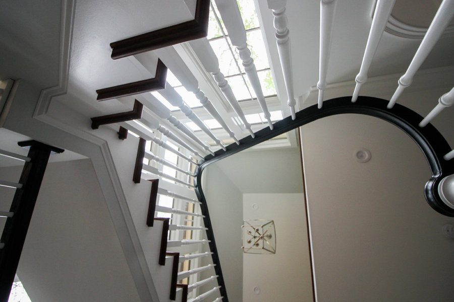 Powerful Impression by Floating Staircase in Suburban Foyer