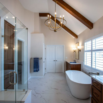 Luxury Spa Bathroom with Natural Warm Vanities, Quartz Countertop, Tiled Shower