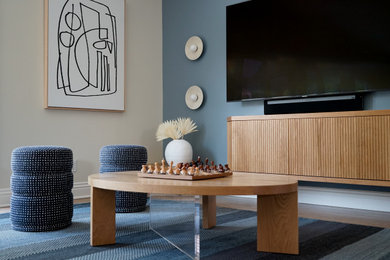 Example of a transitional family room design in Orange County