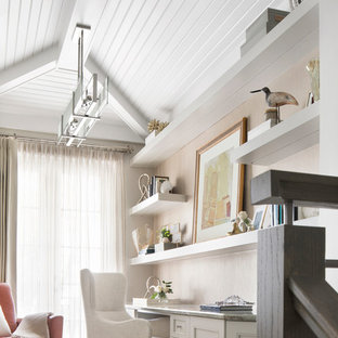 Design ideas for a small beach style study room in Miami with grey walls, laminate floors, a built-in desk and grey floor.