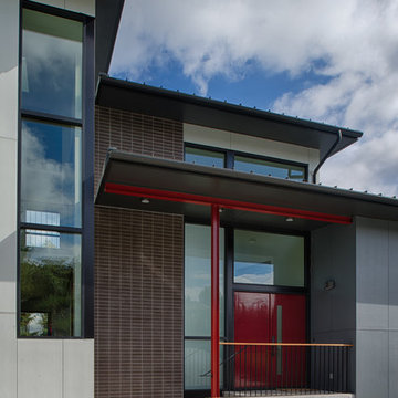 Entry with exposed structure and metal roof