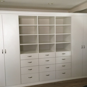 Custom Built in closets and Entertainment center