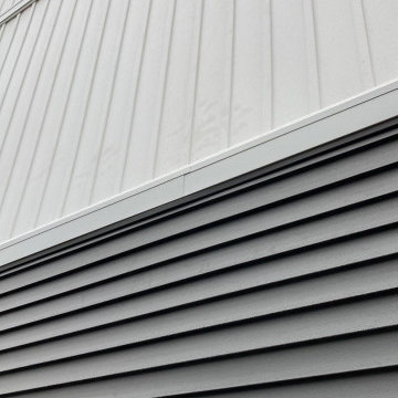 Modern Exterior Renovation with Vinyl Siding & Trim in Commerce Michigan