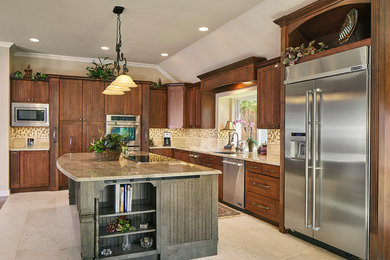 Eat-in kitchen - large transitional l-shaped travertine floor eat-in kitchen idea in Dallas with a double-bowl sink, shaker cabinets, medium tone wood cabinets, granite countertops, multicolored backsplash, stone tile backsplash, stainless steel appliances and an island