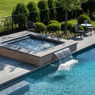 Lake Forest, IL Swimming Pool With Full Steps and Raised Spa With Sheer Descent