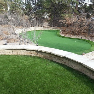 Residential three tiered putting green with chipping areas