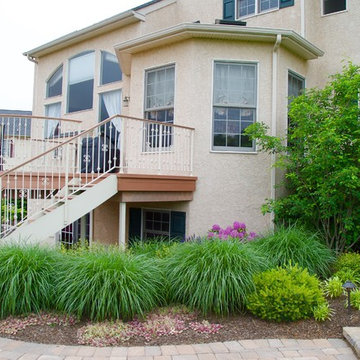 Grasses add texture and movement to the foundation planting