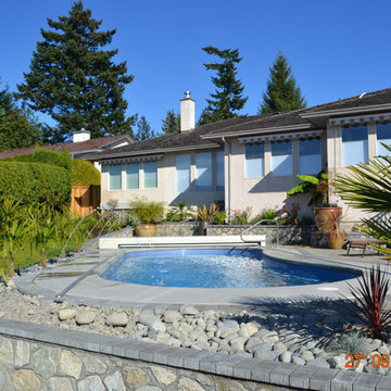 Fibreglass Pool in Saanich with Beautiful Stone Walls