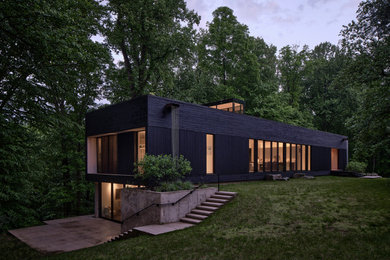 Minimalist black two-story wood exterior home photo in Baltimore
