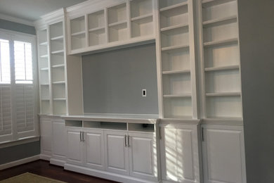 Living room entertainment center, bookshelves and cabinets