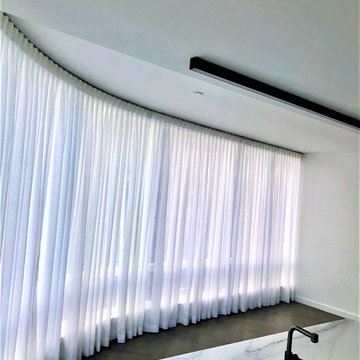 111 Murray St- Battery Operated Shades and Curved Drapery